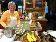 Grandma Daria instructing Isis on the theory of proper chocolate chip placement