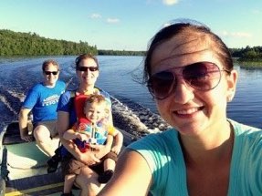 Andy,Sarah, Jacob and Micheala on a lake