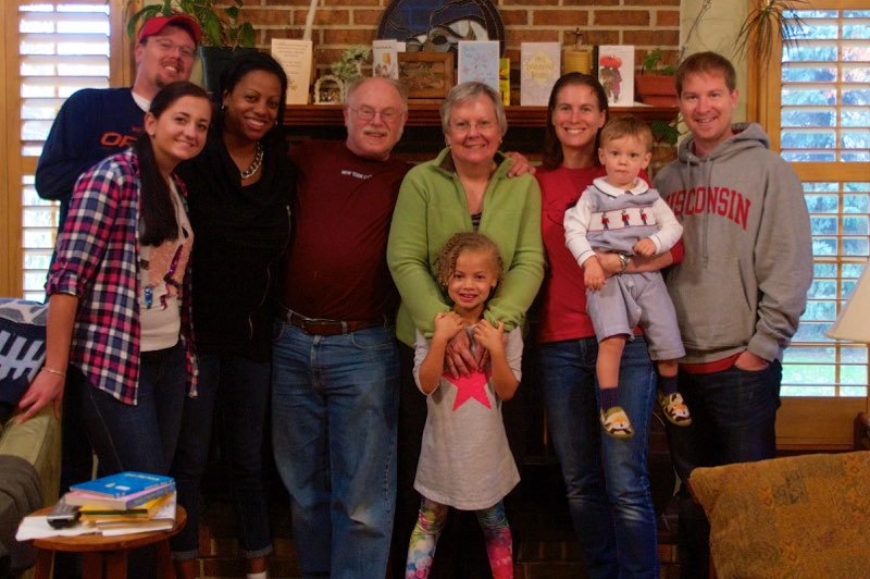 Family in front of Fireplace