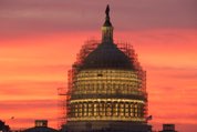 Sunrise behind Capitol dome with frame